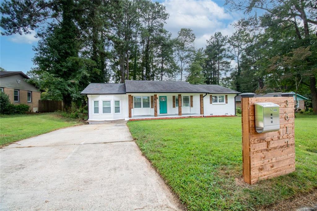 3617 Stanford Circle Decatur, GA 30034 - Photo 1 of 1 a front view of house with yard and green space