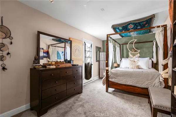 a view of front door with wooden floor