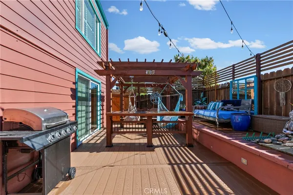 an aerial view of a houses with yard
