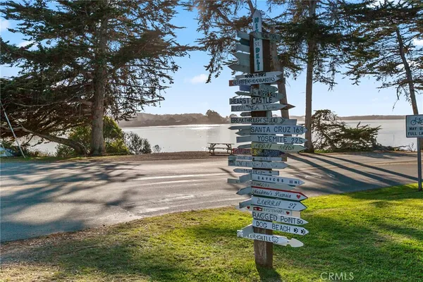 a view of a street with cars on road