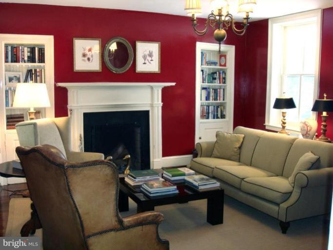 Living room with wood burning fireplace