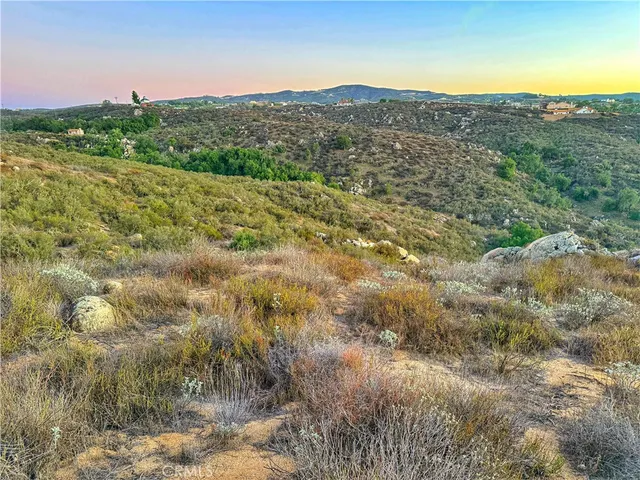 a view of a road with an ocean view