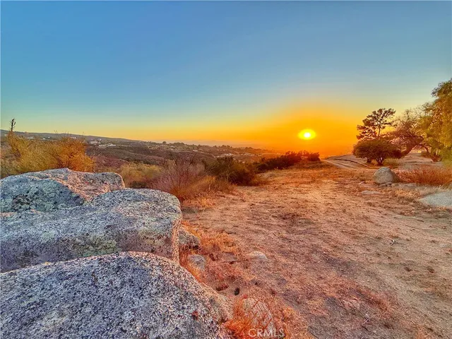 a view of a lake with mountains in the background