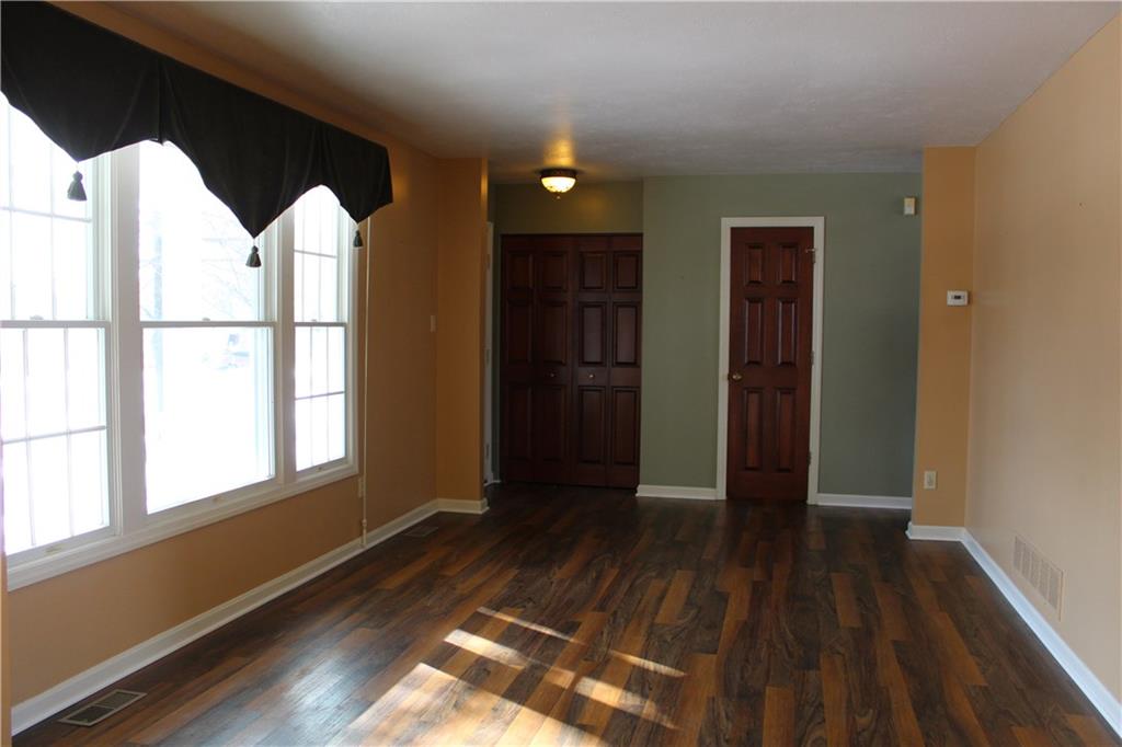 255 Randy Lane Coraopolis, PA 15108 - Photo 7 of 16 Formal Living Room features Neutral Dcor' and beautiful hardwood floors and wood-work.