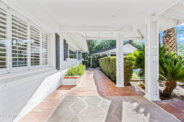 a house with garden in front of it