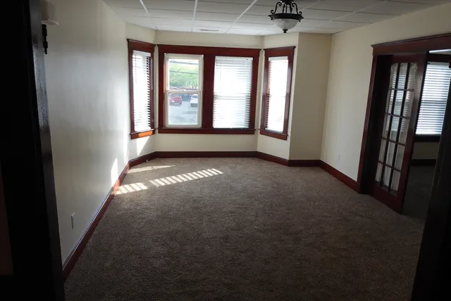 an empty room with windows