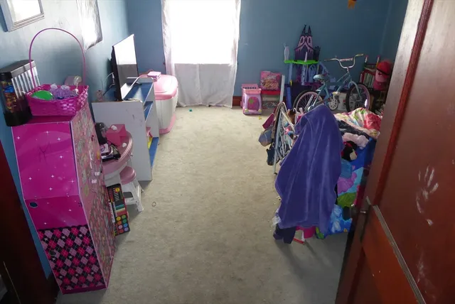 a room with furniture and a window