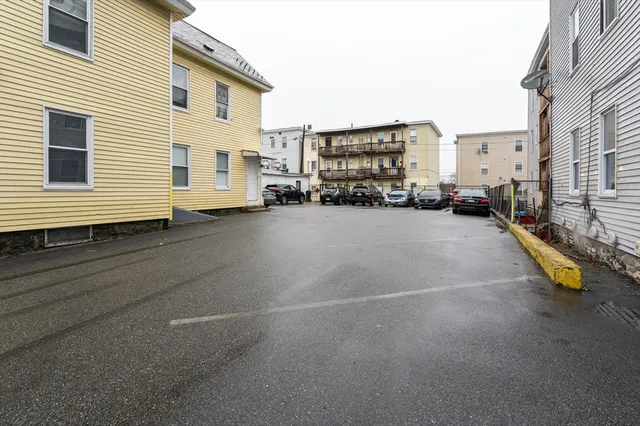a view of a street with cars