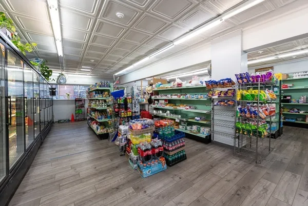a garage with lots of fruit and lots of furniture