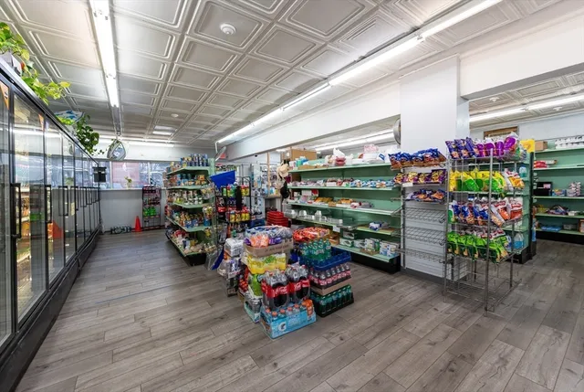 a garage with lots of fruit and lots of furniture