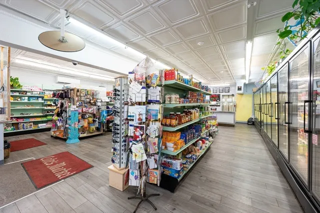 a storage room with furniture and a ceiling fan