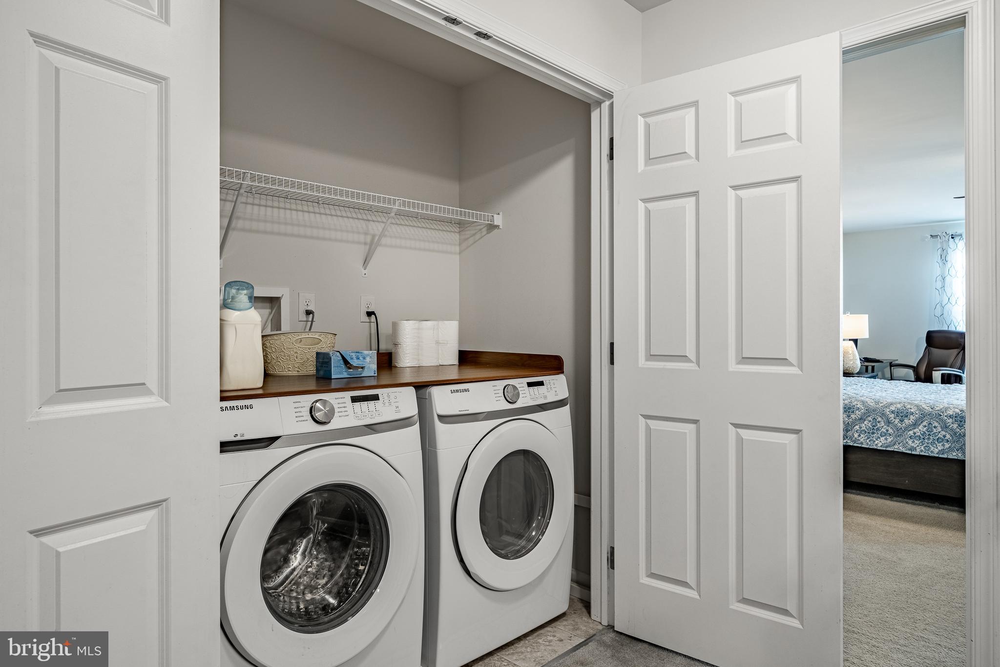 25 North Tompkins Square Downingtown, PA 19335 - Photo 22 of 53 a view of a hallway with washer and dryer