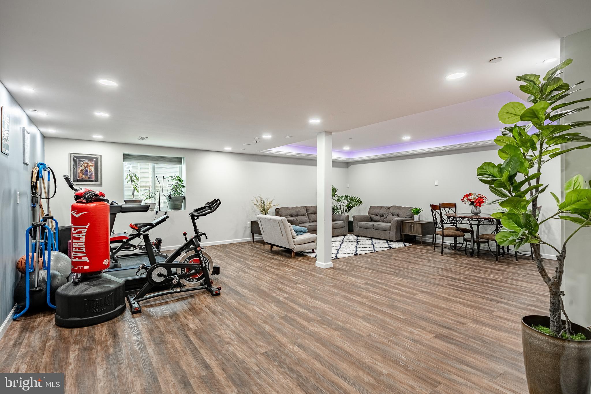 25 North Tompkins Square Downingtown, PA 19335 - Photo 32 of 53 a view of a room with gym equipment and a large mirror