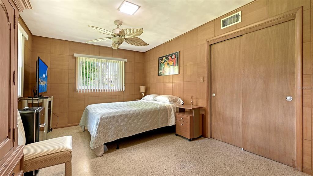 3012 Desoto Road Sarasota, FL 34234 - Photo 46 of 78 a bedroom with a bed dresser and a window