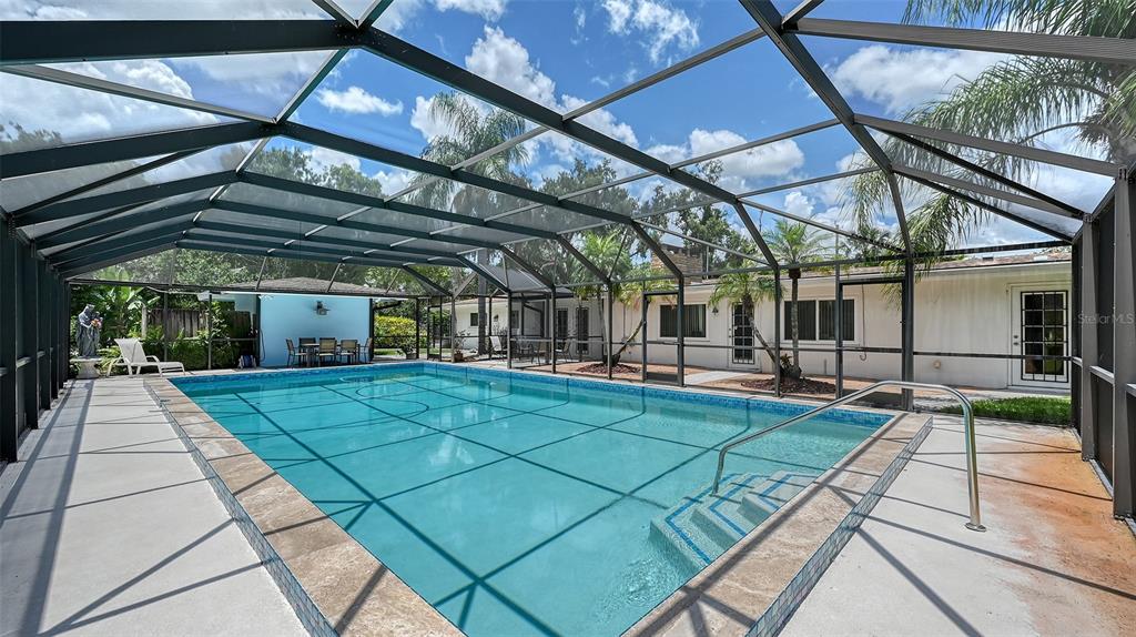 3012 Desoto Road Sarasota, FL 34234 - Photo 51 of 78 a view of a swimming pool with a patio