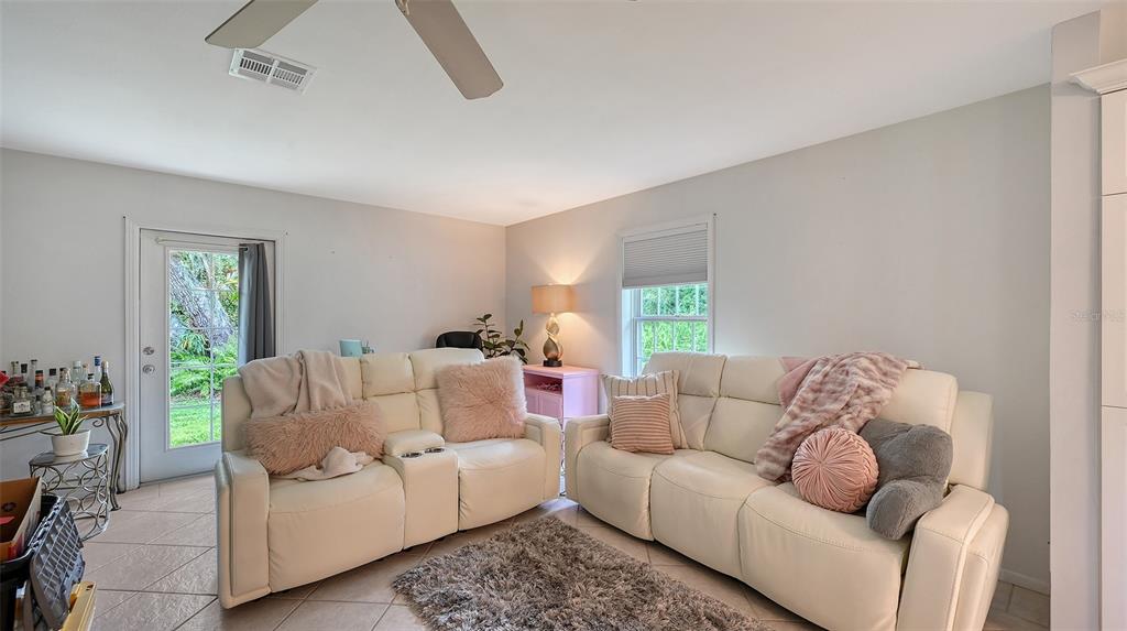 3012 Desoto Road Sarasota, FL 34234 - Photo 63 of 78 a living room with furniture and a window