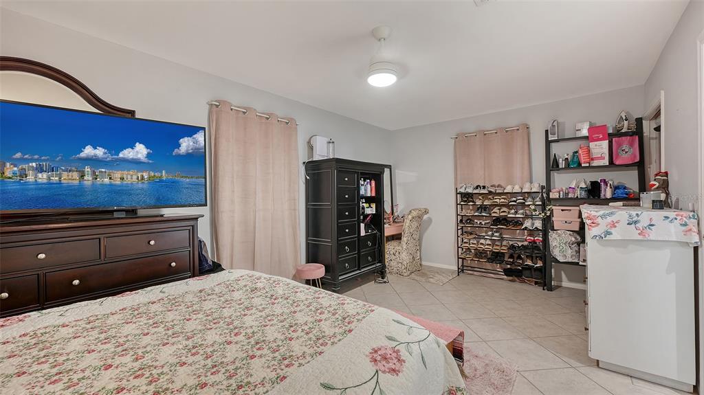 3012 Desoto Road Sarasota, FL 34234 - Photo 67 of 78 a bedroom with a bed and a television