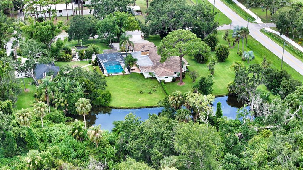 3012 Desoto Road Sarasota, FL 34234 - Photo 72 of 78 an aerial view of residential house with outdoor space and trees all around