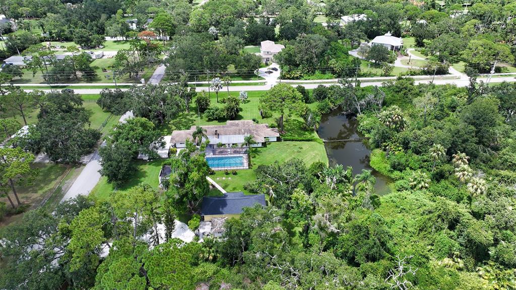3012 Desoto Road Sarasota, FL 34234 - Photo 75 of 78 an aerial view of a house with yard swimming pool and outdoor seating