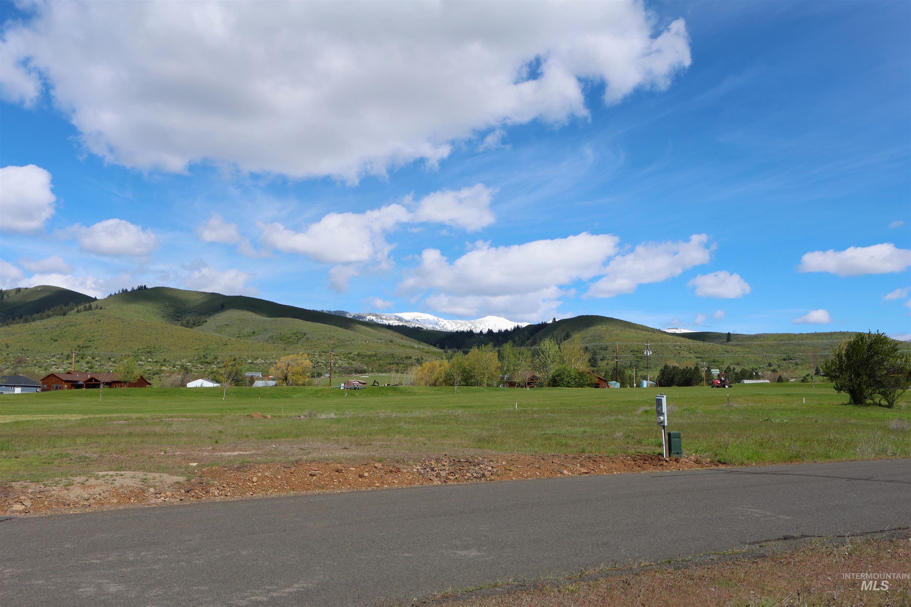 2278 Golf Lane Council, ID 83612 - Photo 28 of 31 Expansive land parcel featuring open grassy areas, distant mountainous terrain, and clear skies