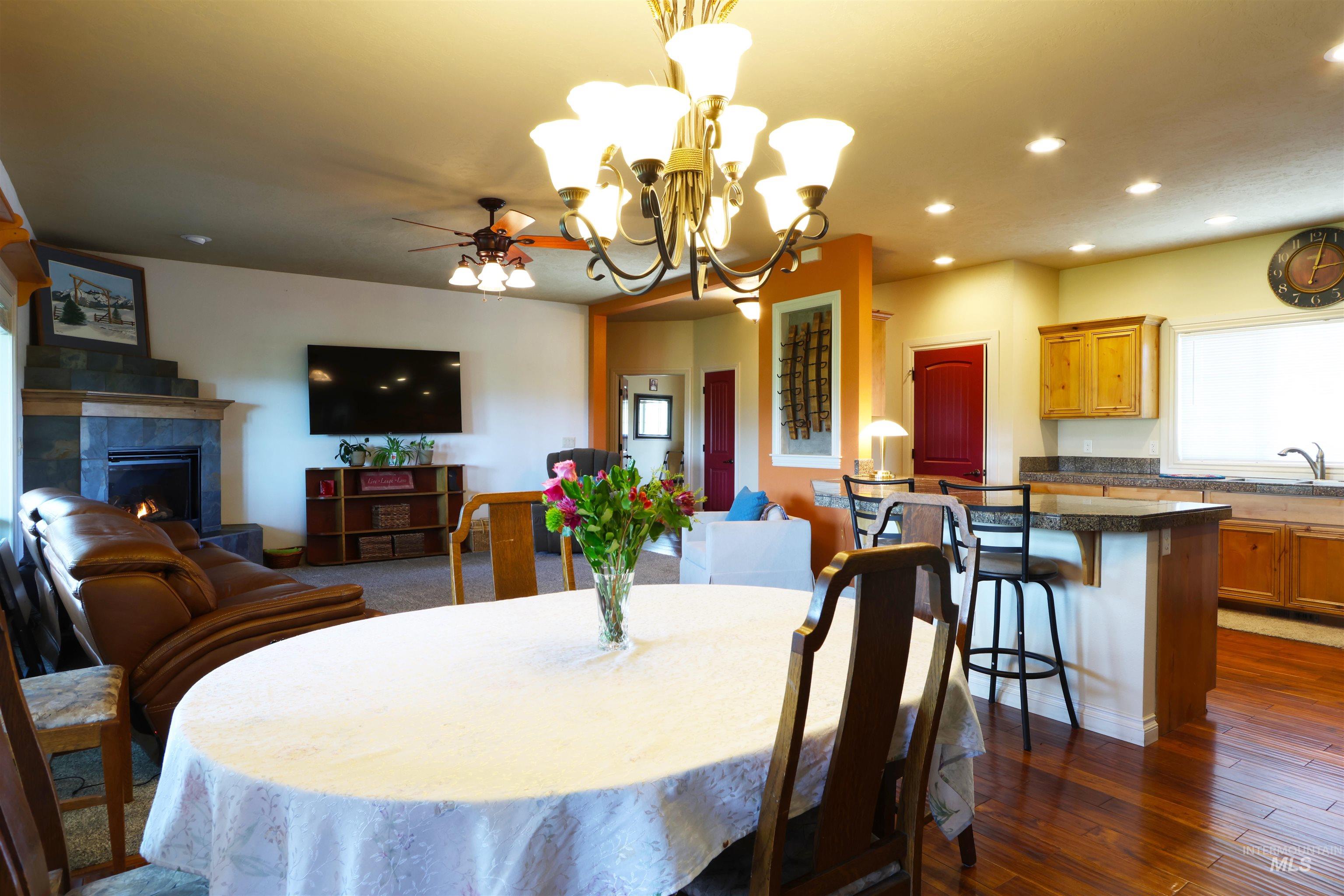 2278 Golf Lane Council, ID 83612 - Photo 6 of 31 Dining area featuring a classic chandelier with frosted glass shades