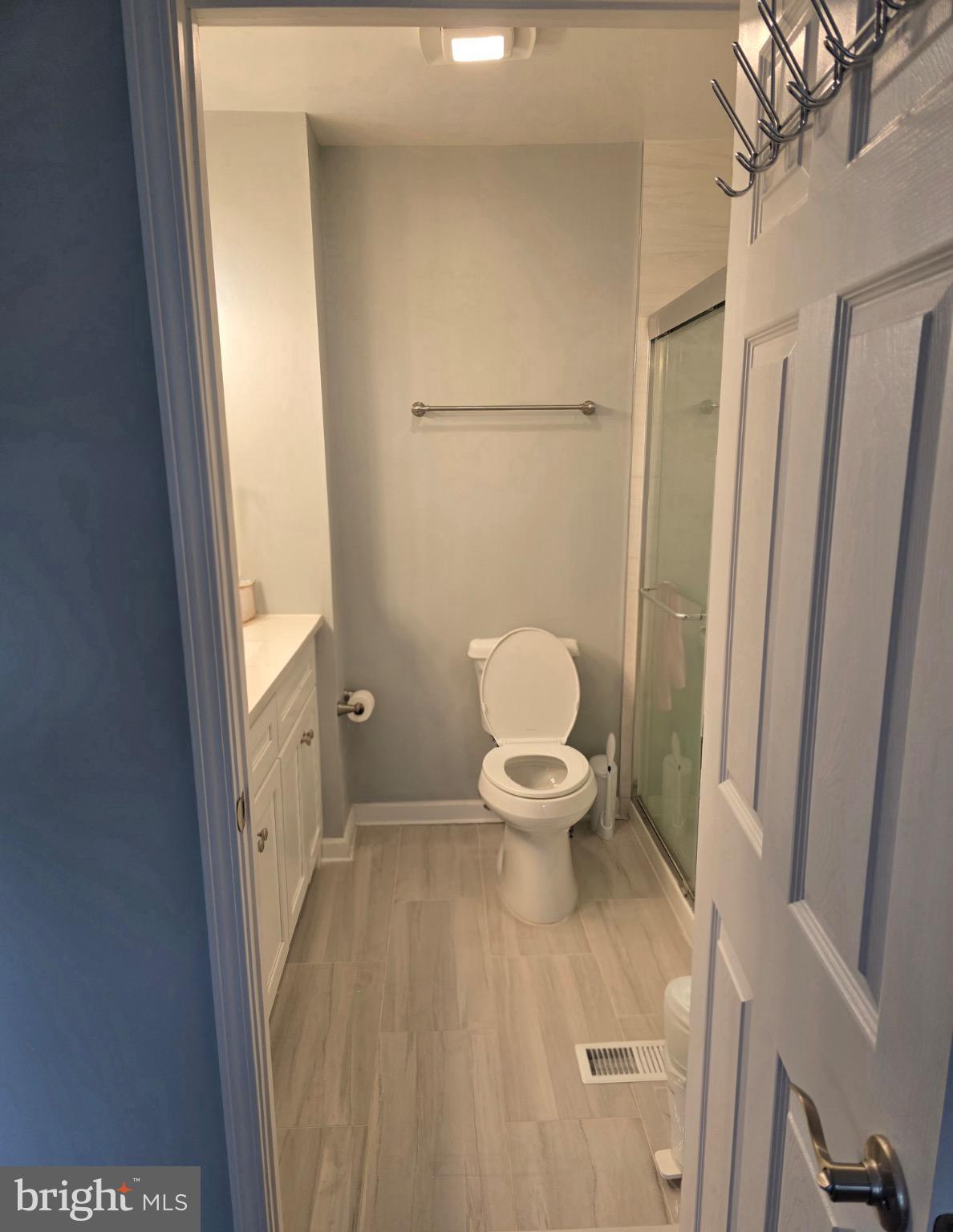 18420 Point Seneca Place, Unit BEDROOM 2 Germantown, MD 20874 - Photo 6 of 9 Modern Primary bathroom with sleek finishes.