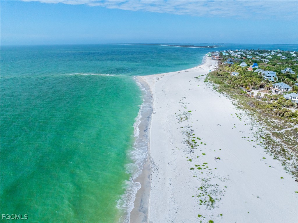 4490 Conch Shell Drive Captiva, FL 33924 - Photo 25 of 32 a view of a lake with a beach