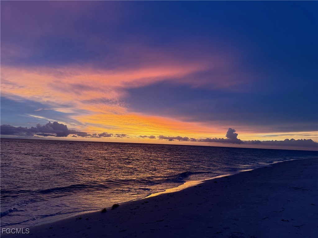 4490 Conch Shell Drive Captiva, FL 33924 - Photo 6 of 32 a view of an ocean and beach