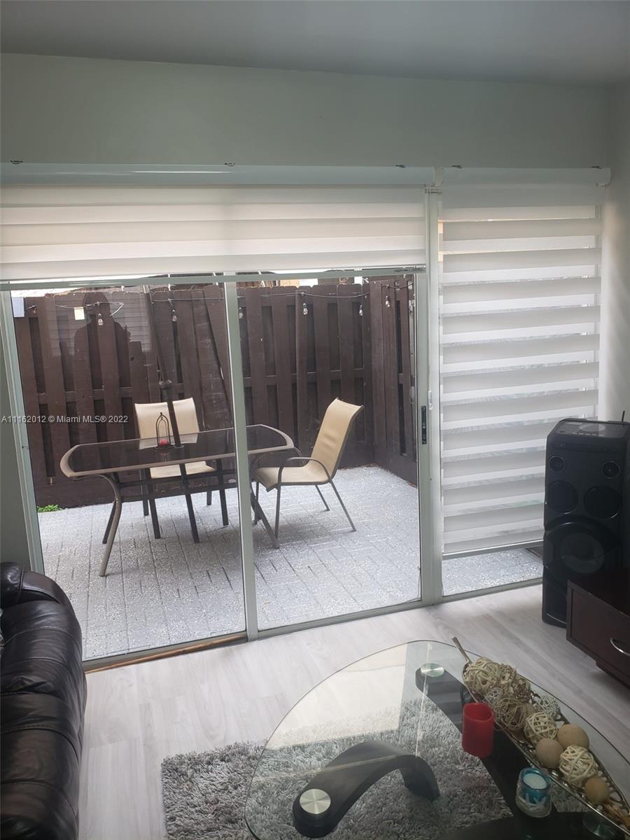 Kendale Lakes Miami, FL 33183 - Photo 9 of 9 a view of a livingroom with furniture and outdoor seating