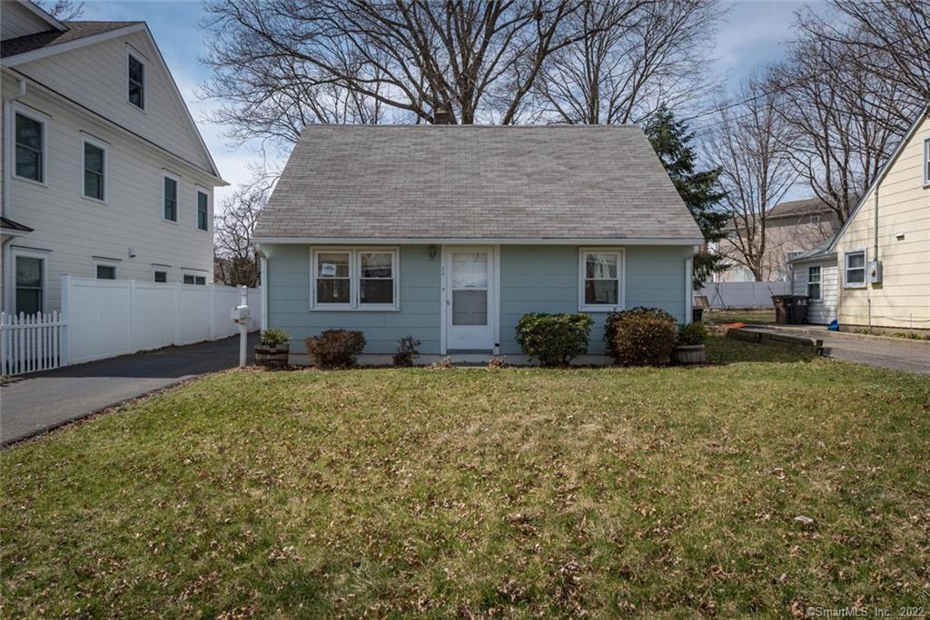 a house with trees in front of it