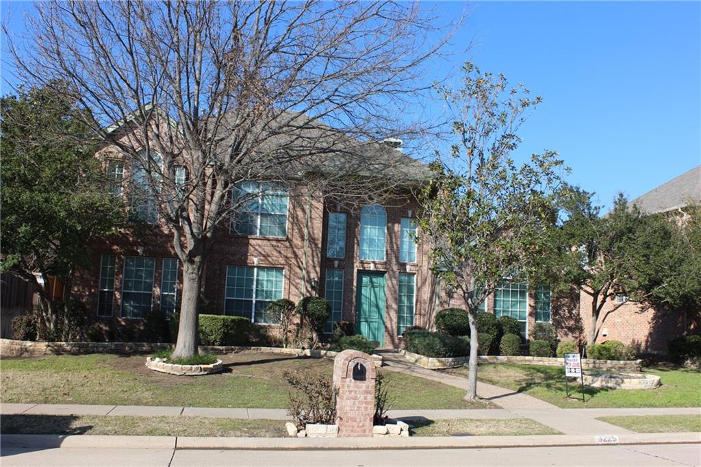 3225 Wells Drive Plano, TX 75093 - Photo 1 of 1 a view of a building with a tree