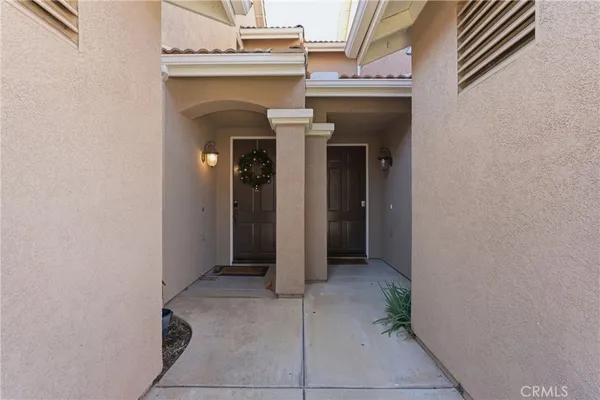 a view of a hallway with entryway