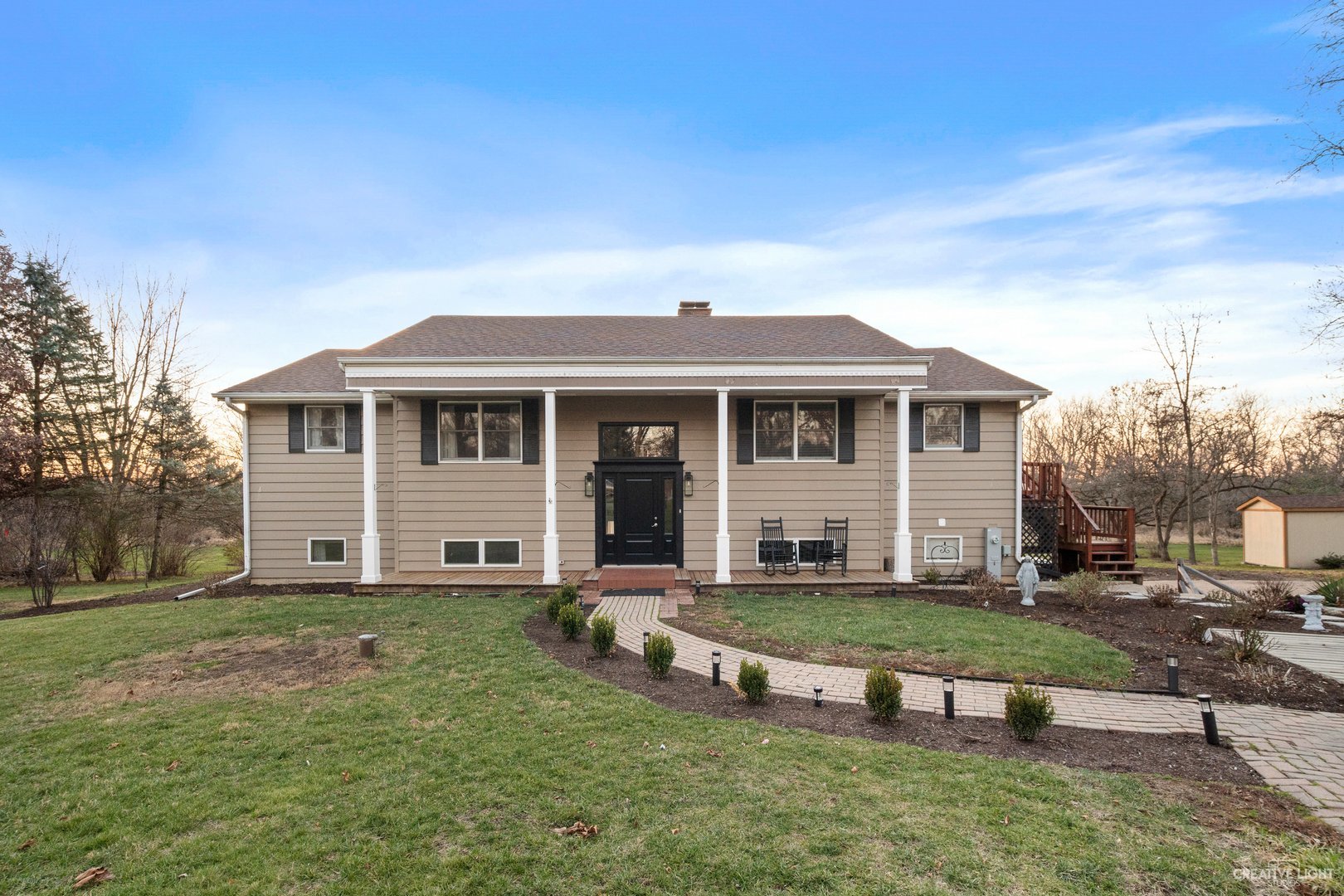 4S064 Thornapple Tree Road Sugar Grove, IL 60554 - Photo 1 of 39 a front view of a house with a yard
