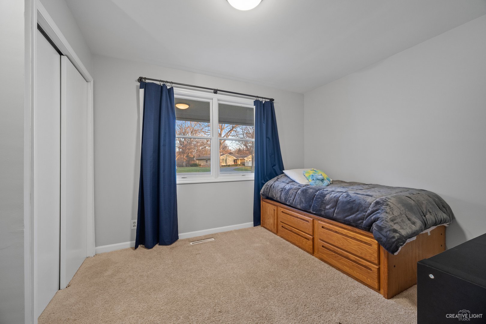 4S064 Thornapple Tree Road Sugar Grove, IL 60554 - Photo 17 of 39 a bed sitting in a bedroom next to a window