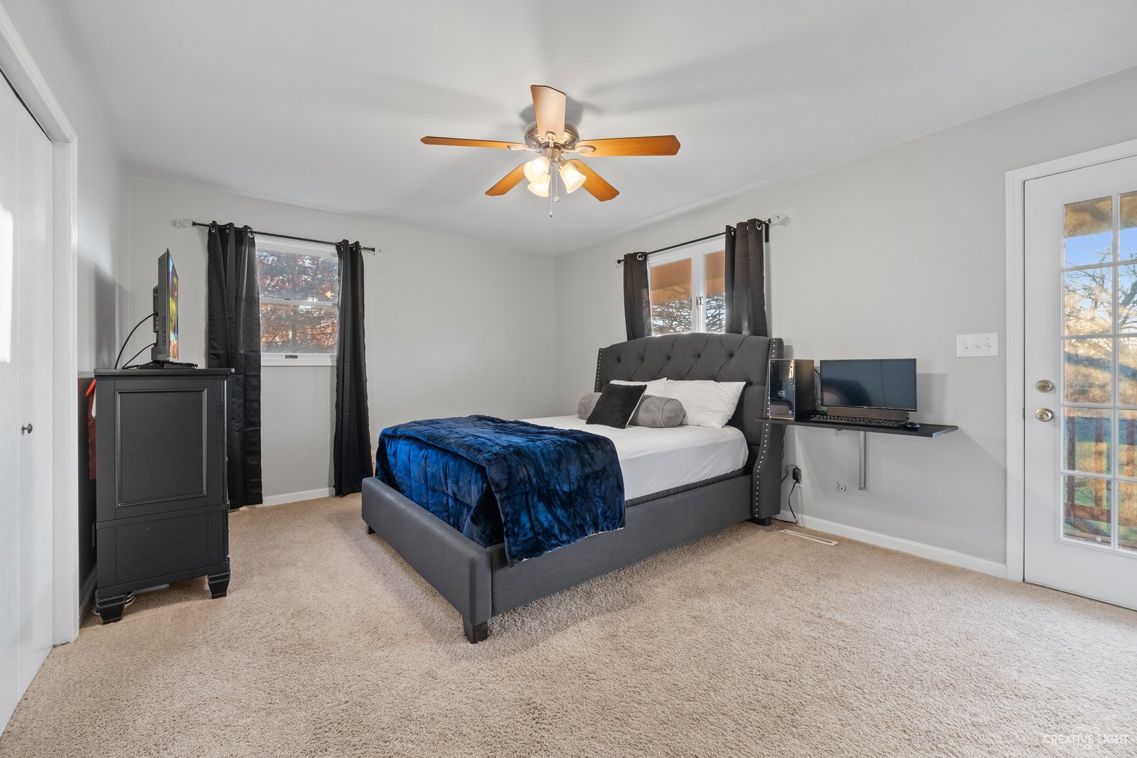 4S064 Thornapple Tree Road Sugar Grove, IL 60554 - Photo 18 of 39 a bedroom with a bed and a chandelier