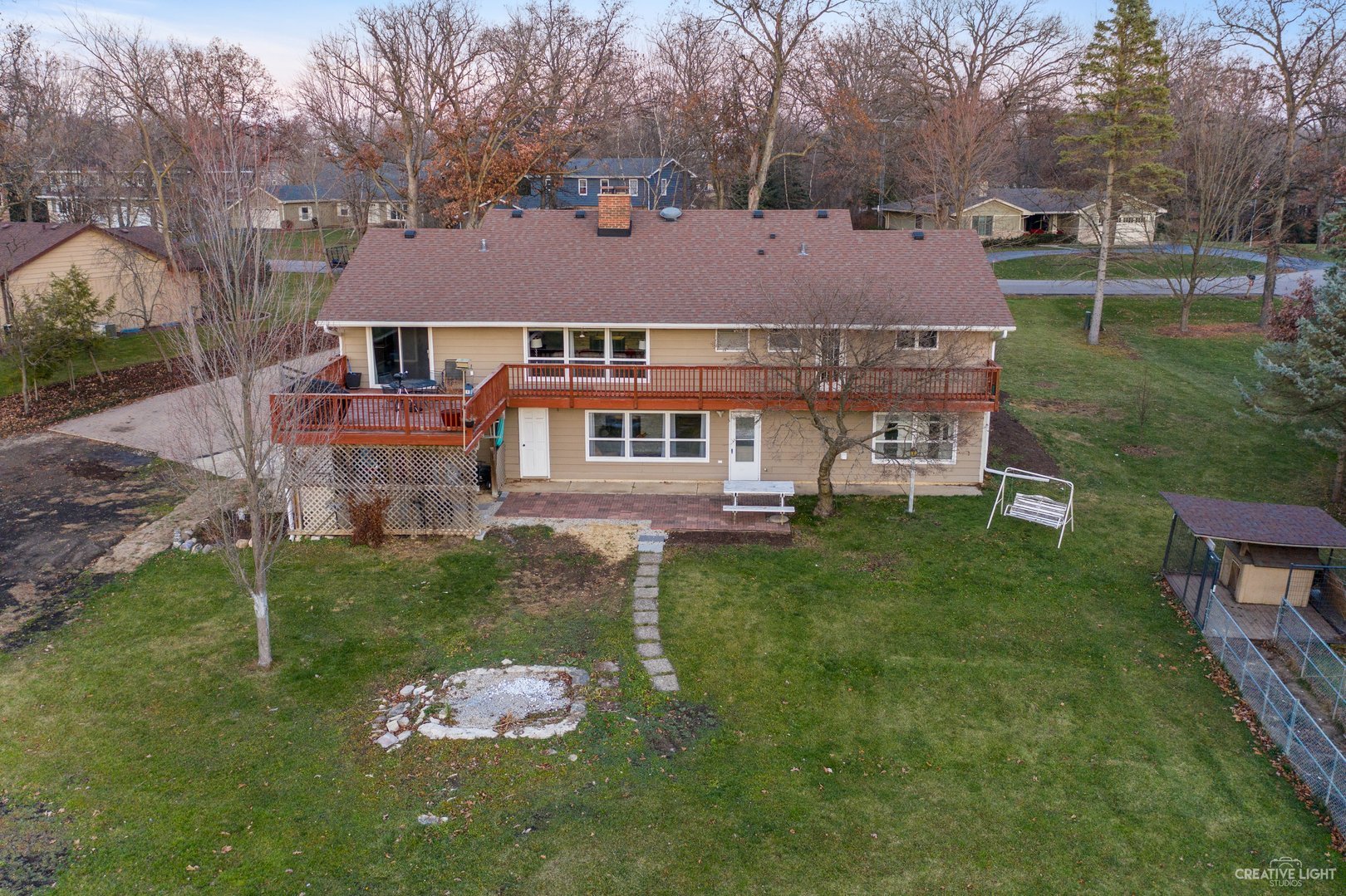 4S064 Thornapple Tree Road Sugar Grove, IL 60554 - Photo 30 of 39 a backyard of a house with table and chairs