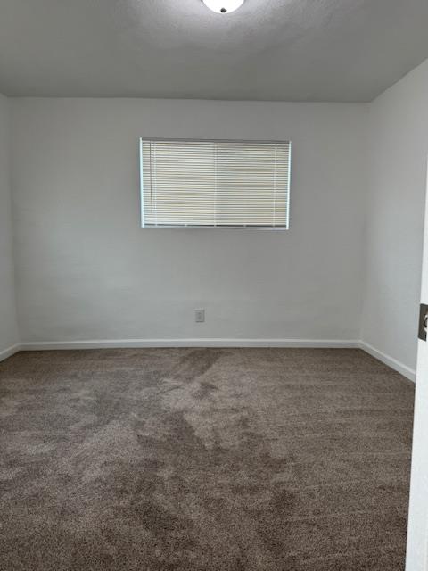 16286 Letteau Avenue Delhi, CA 95315 - Photo 11 of 16 a view of a room that has a window in it