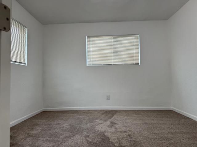 16286 Letteau Avenue Delhi, CA 95315 - Photo 12 of 16 an empty room with a window