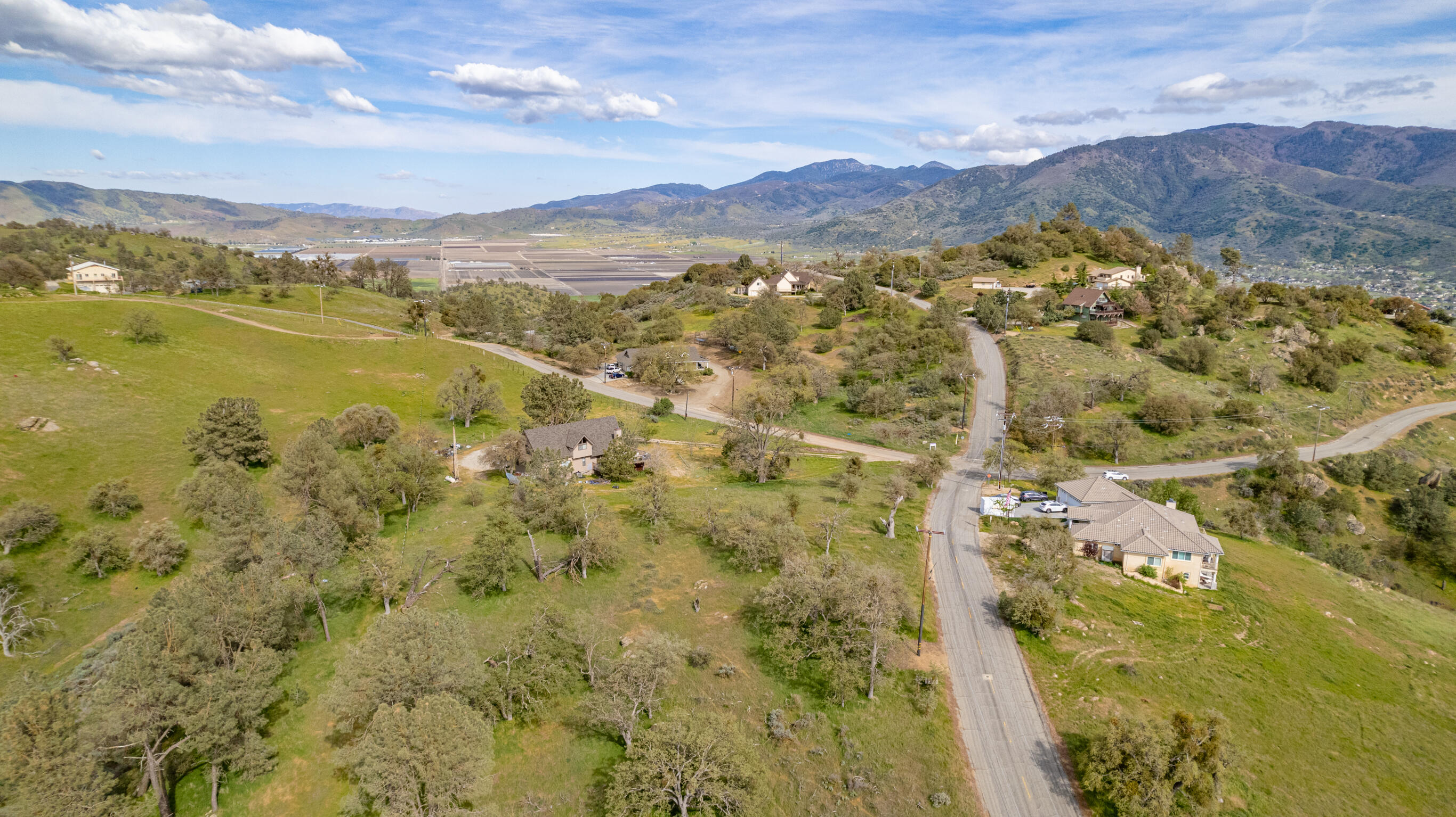 a view of a city with mountains in the background