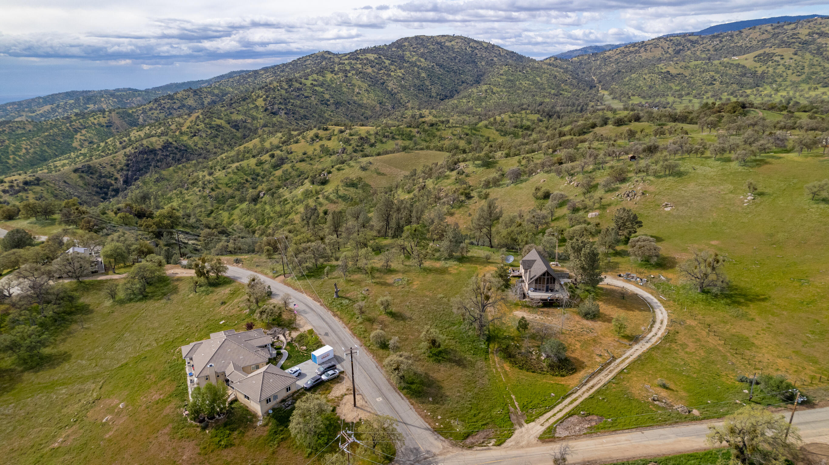 Peregrine Place Tehachapi, CA 93561 - Photo 4 of 16 a view of a lake with a mountain in the background