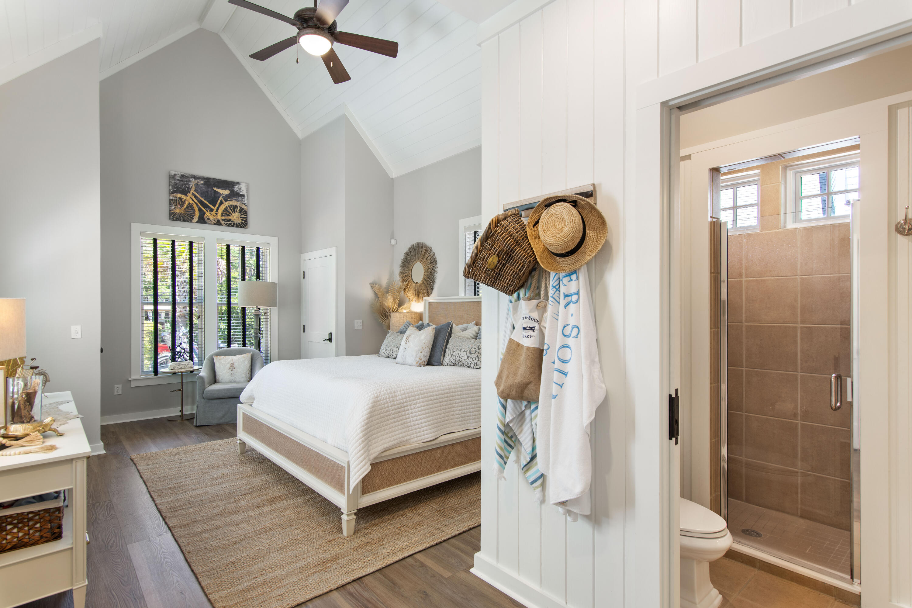 260 Salt Inlet Beach Inlet Beach, FL 32461 - Photo 16 of 39 a bedroom with a bed and a mirror