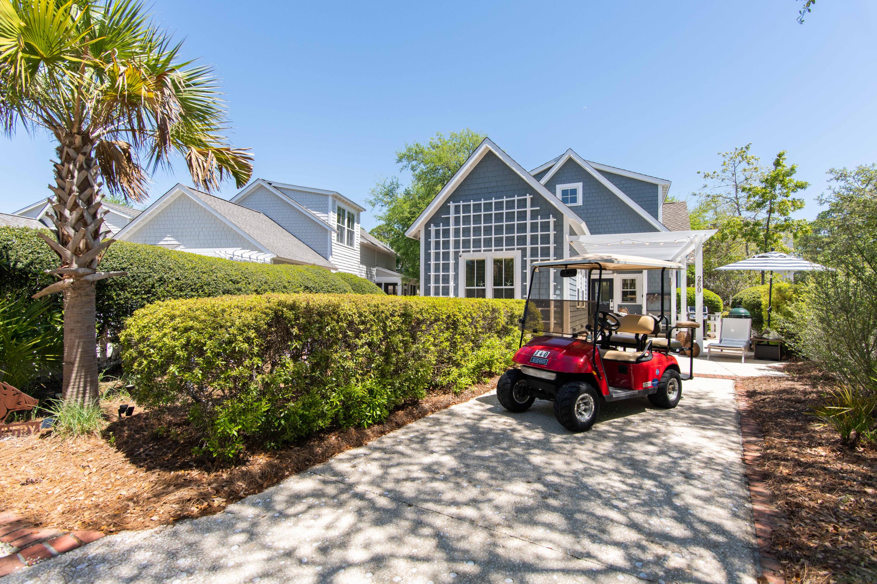 260 Salt Inlet Beach Inlet Beach, FL 32461 - Photo 34 of 39 a front view of a house with garden