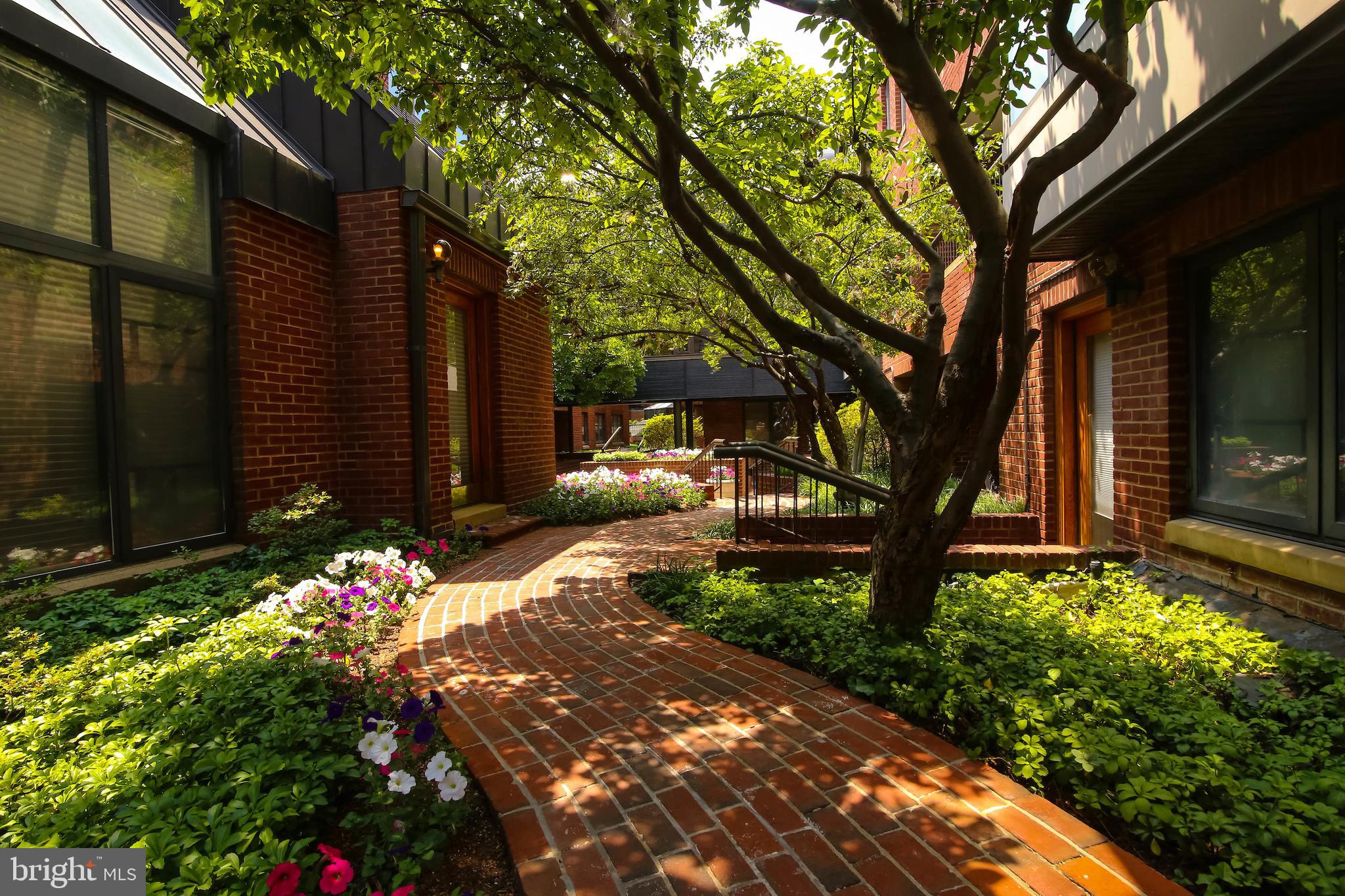 1080 Wisconsin Avenue Northwest, Unit 2001 Washington, DC 20007 - Photo 2 of 27 Interior Gardens & Brick Walkways