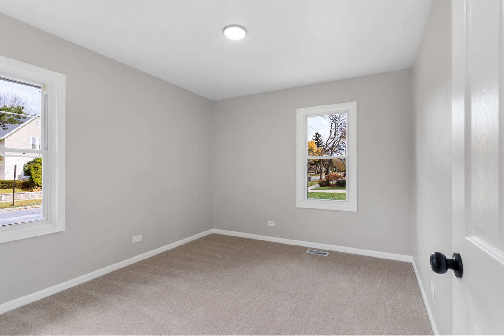 407 North Liberty Street Elgin, IL 60120 - Photo 11 of 18 an empty room with a window