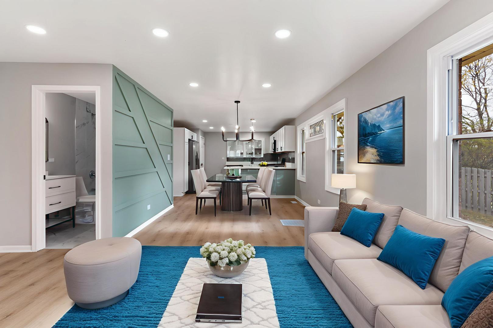 407 North Liberty Street Elgin, IL 60120 - Photo 5 of 18 a living room with furniture and a chandelier