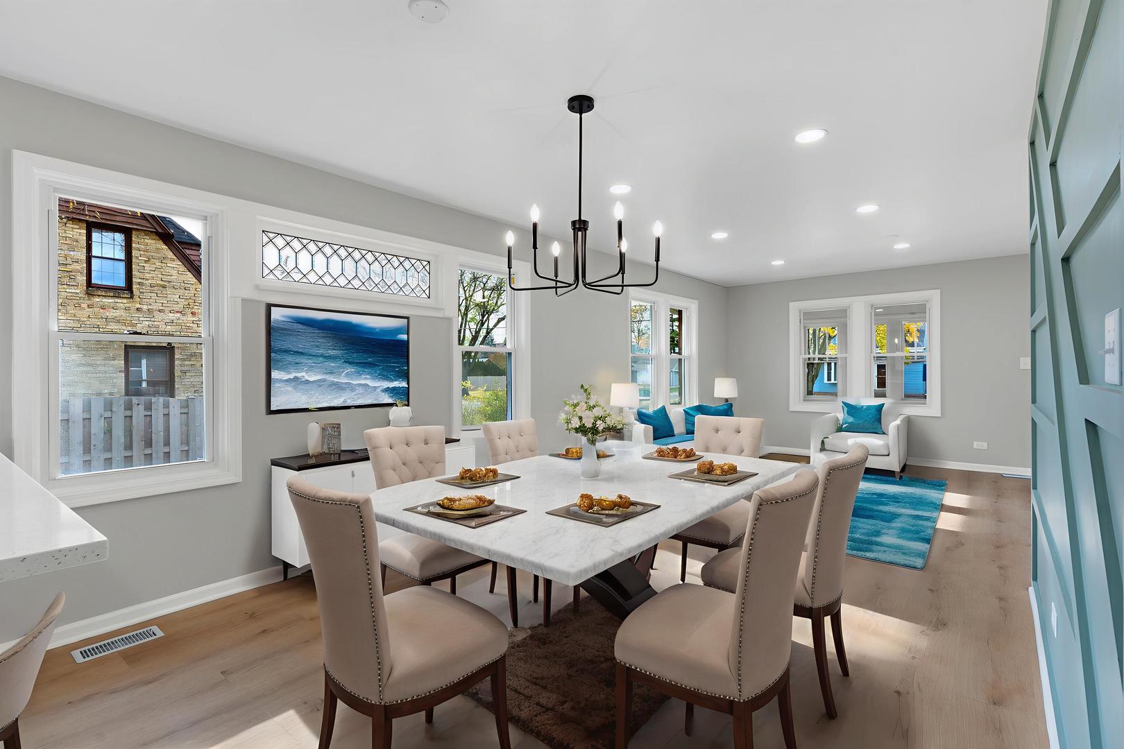 407 North Liberty Street Elgin, IL 60120 - Photo 8 of 18 a view of a dining room with furniture window and wooden floor