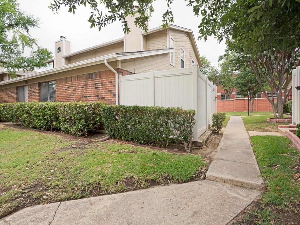 2240 Tarpley Road, Unit 92 Carrollton, TX 75006 - Photo 21 of 22 a view of a back yard of the house