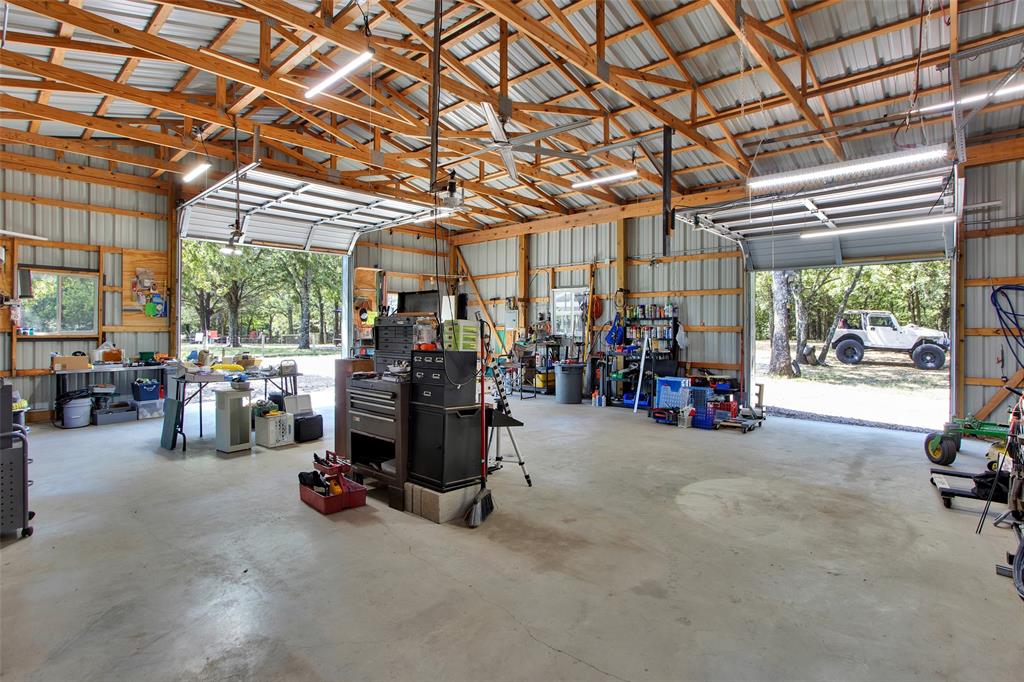 1793 Greer Road Sadler, TX 76264 - Photo 24 of 35 Shop interior with two single roll up doors