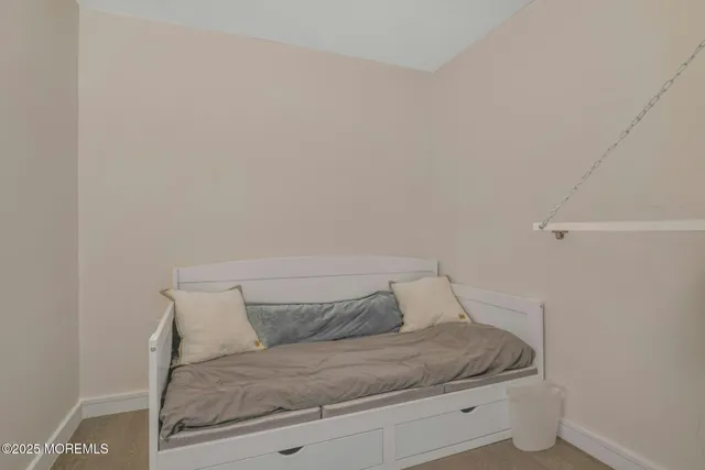 a view of a room with racks on the wall