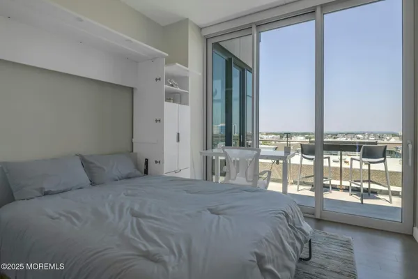 a bathroom with a sink a toilet and shower curtain